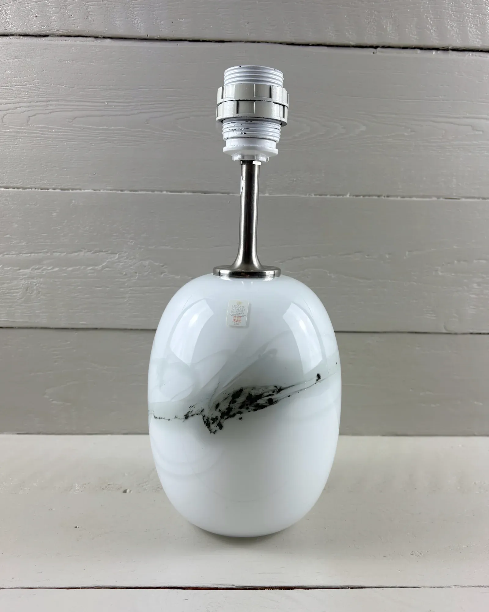 Holmegaard Sakura lamp by Michael Bang, white glass body with black swirl, bare front view