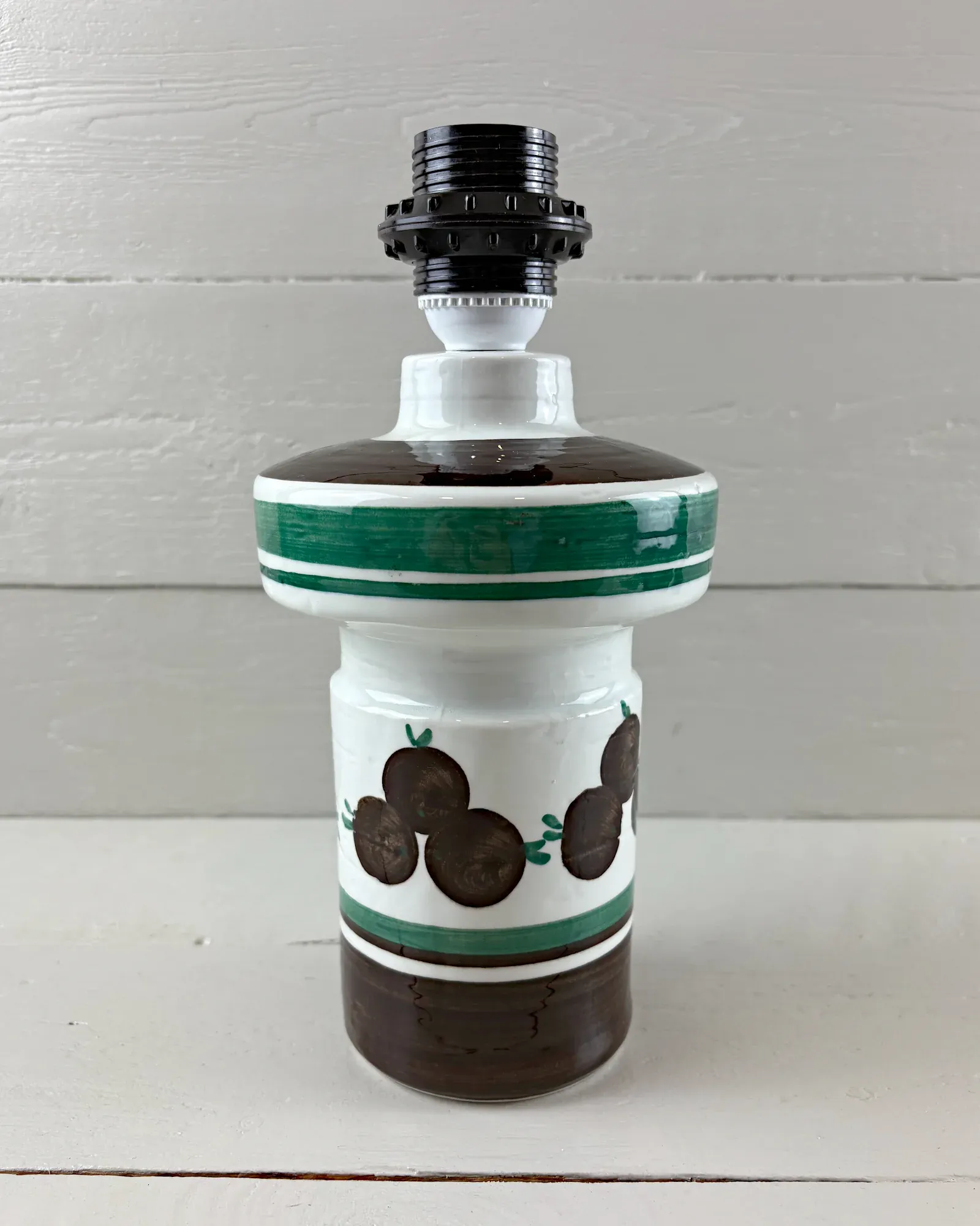 Mid-century Swedish Rorstrand ceramic table lamp base, white glaze, brown fruits and green bands, front view