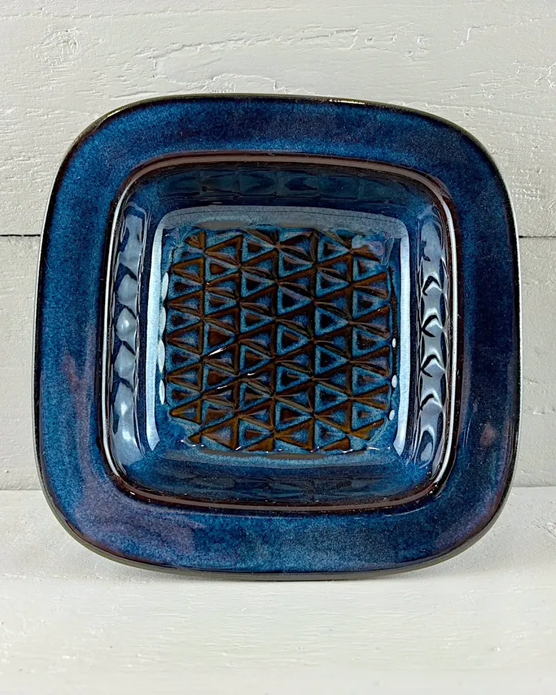 Top view of Søholm stoneware bowl 3335 by Einar Johansen, relief of small triangles under cobalt glaze