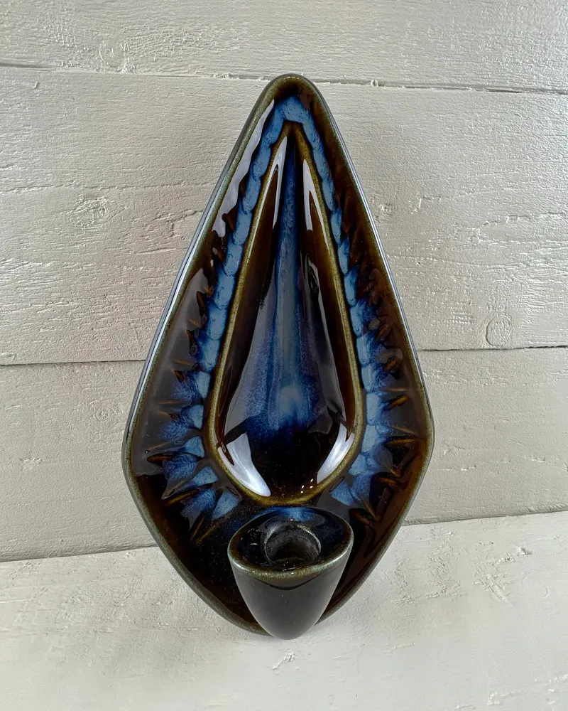Soholm stoneware wall candle holder by Einar Johansen from the side, round candle cup at the base