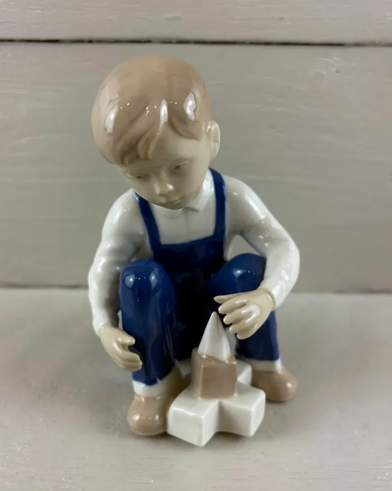 German Grafenthal Porcelain Figurine of a Boy Playing with Building Blocks