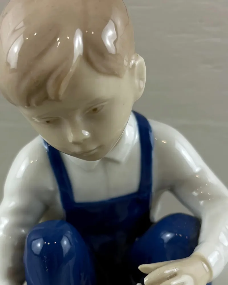 German Grafenthal Porcelain Figurine of a Boy Playing with Building Blocks