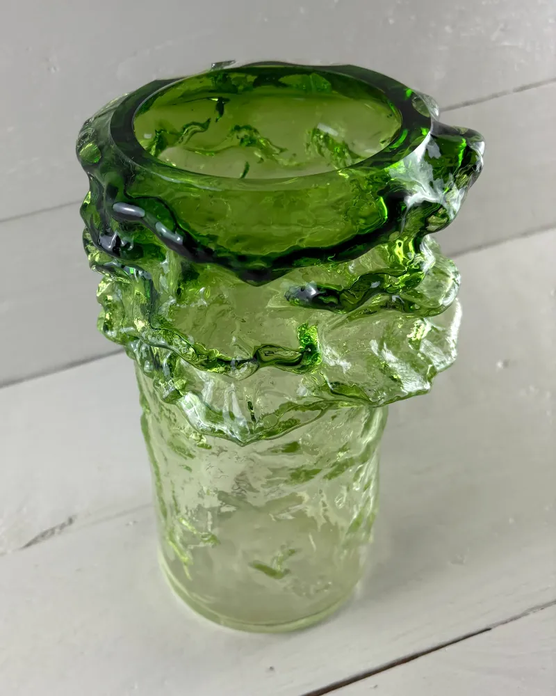Kumela Pahka glass vase seen from above, with the thick green rim and the inside of the mouth