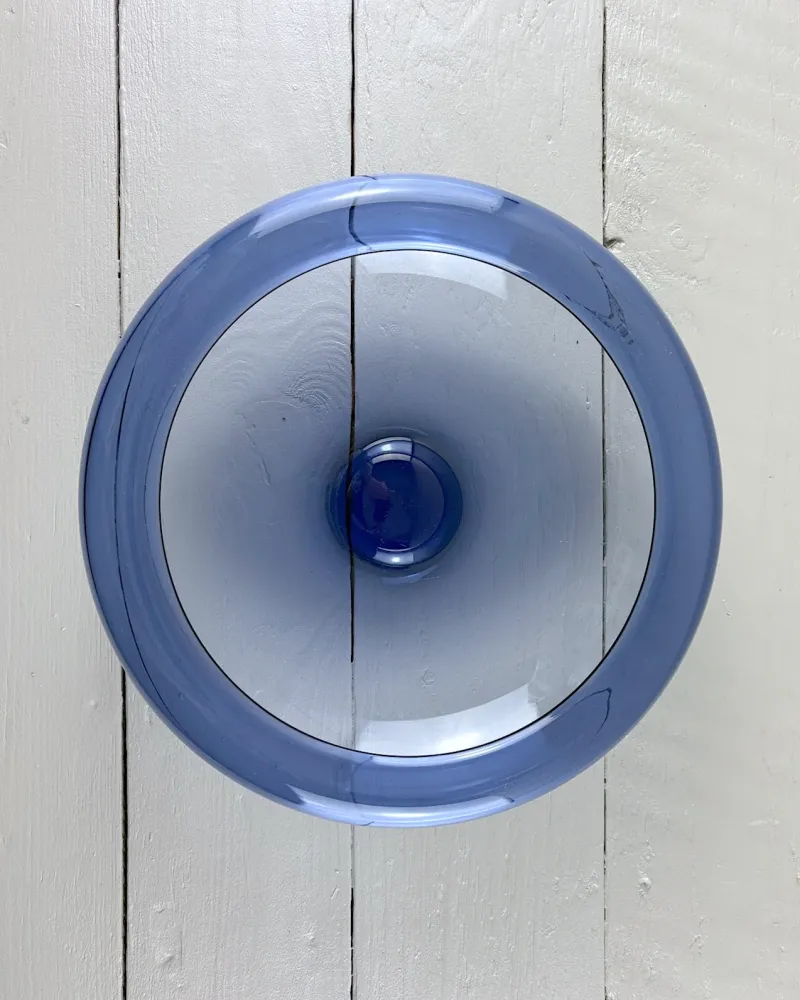 Top view of a blue Per Lütken Provence bowl by Holmegaard, with the rolled rim and deep central well