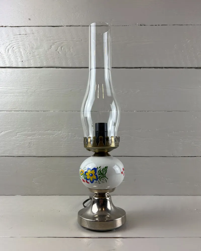Polish Polam table lamp with a floral ceramic globe, tall glass chimney and silver-toned plated metal foot