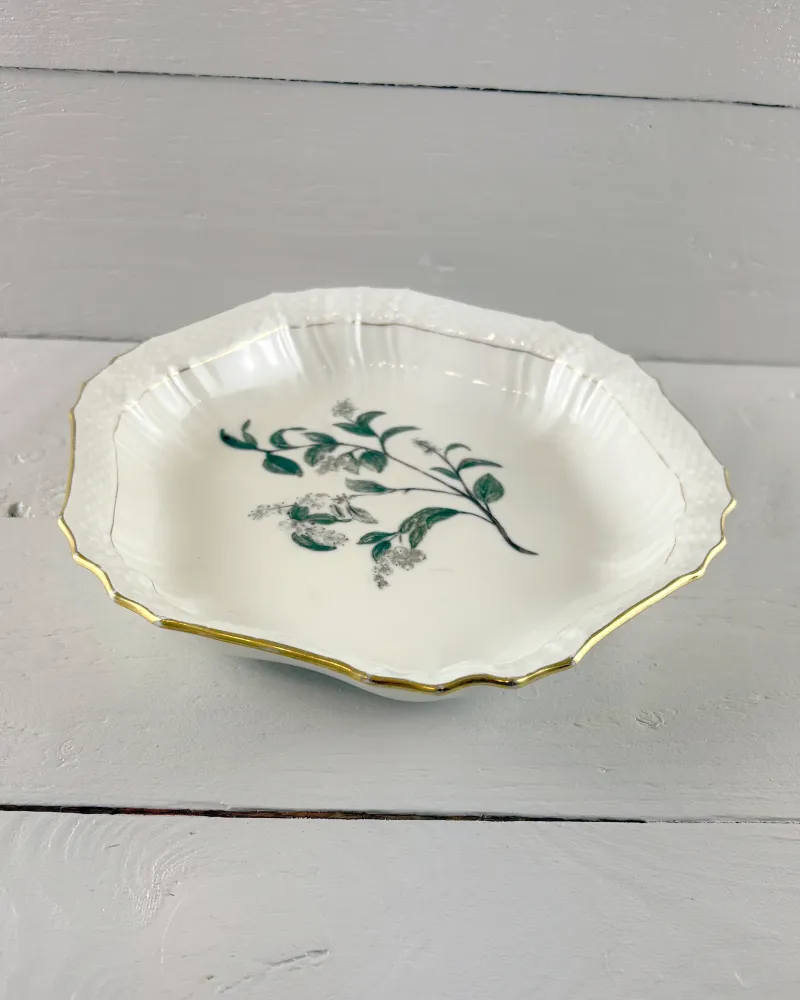Early 20th century Royal Copenhagen porcelain dish with basket-weave rim, three-quarter view