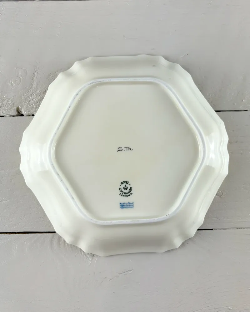 Underside of a hexagonal Royal Copenhagen porcelain dish showing the foot rim and factory marks