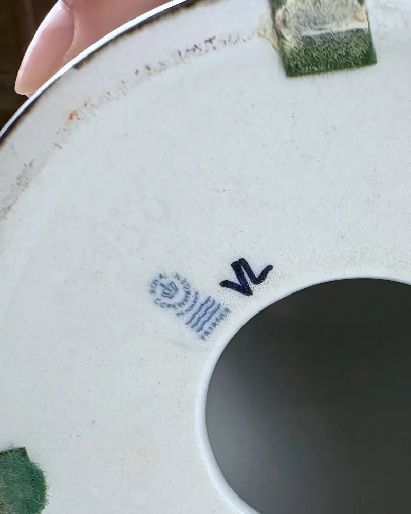 Discoloured, worn foot ring and glaze edge on the underside of a Tenera ceramic lamp base