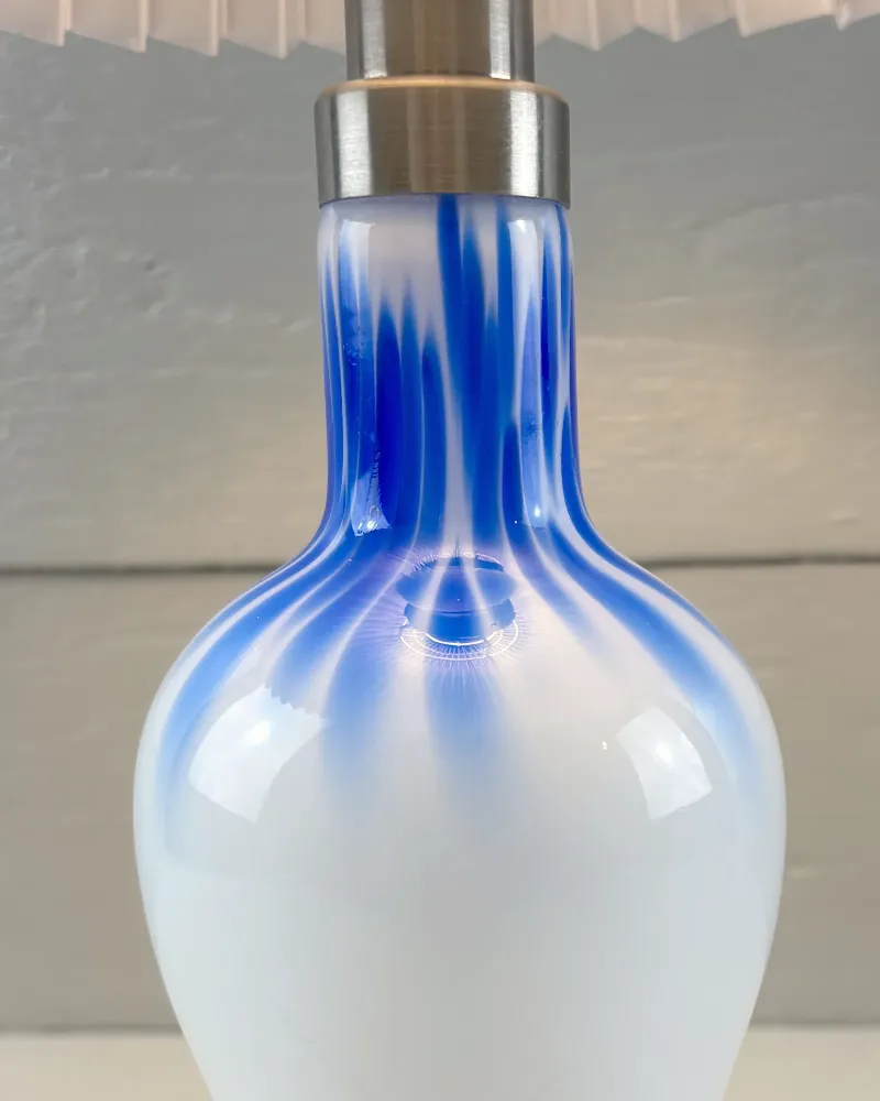 Close-up of blue cased glass streaks on the neck of a Torino Lille opal table lamp by Michael Bang