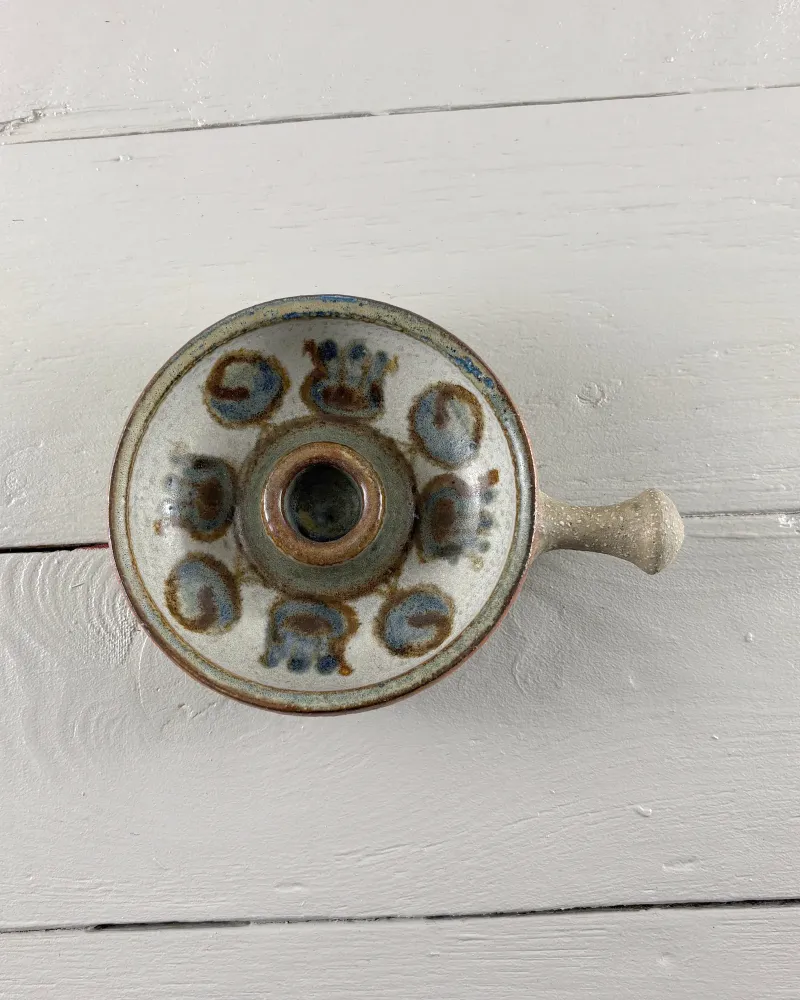 Medium Soholm stoneware candle holder from above, with hand-painted blue and brown motifs