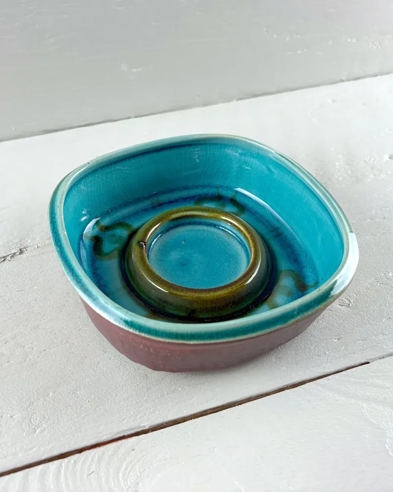 Danish Soholm stoneware bowl by Einar Johansen at a three-quarter angle, showing the rim and crackled turquoise glaze
