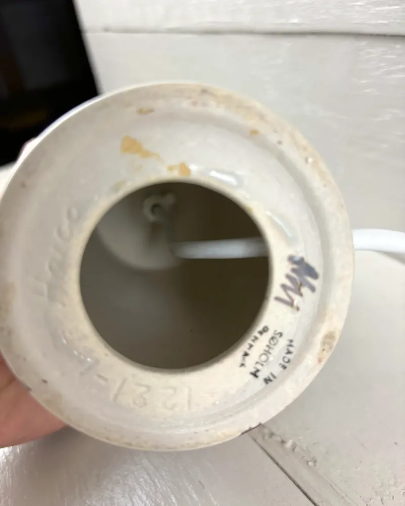 Underside of a Soholm Lilia 1221 lamp base with Made in Denmark mark, number 1221 and impressed signature