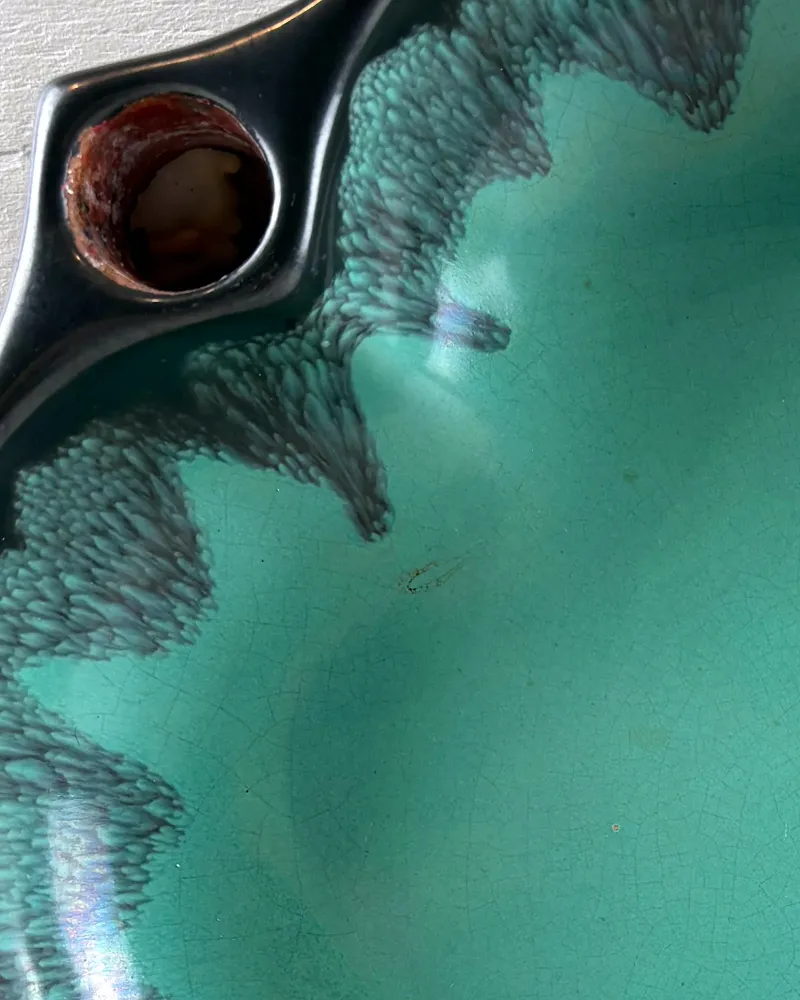 Fine crazing in the turquoise glaze and a small surface mark inside the Upsala-Ekeby advent candle holder